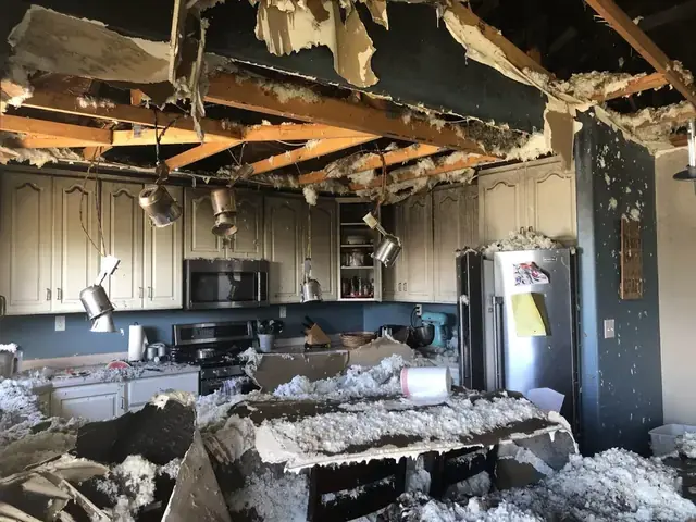 A wall opened to dry the cavity in a north Utah County home